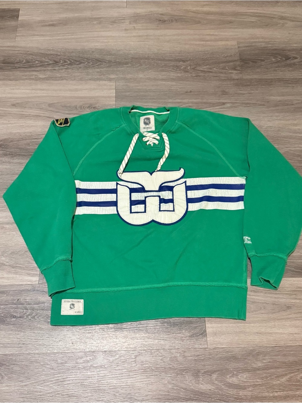 CCM Green Whalers Lace-Up Crewneck Sweatshirt with White and Navy Stripes